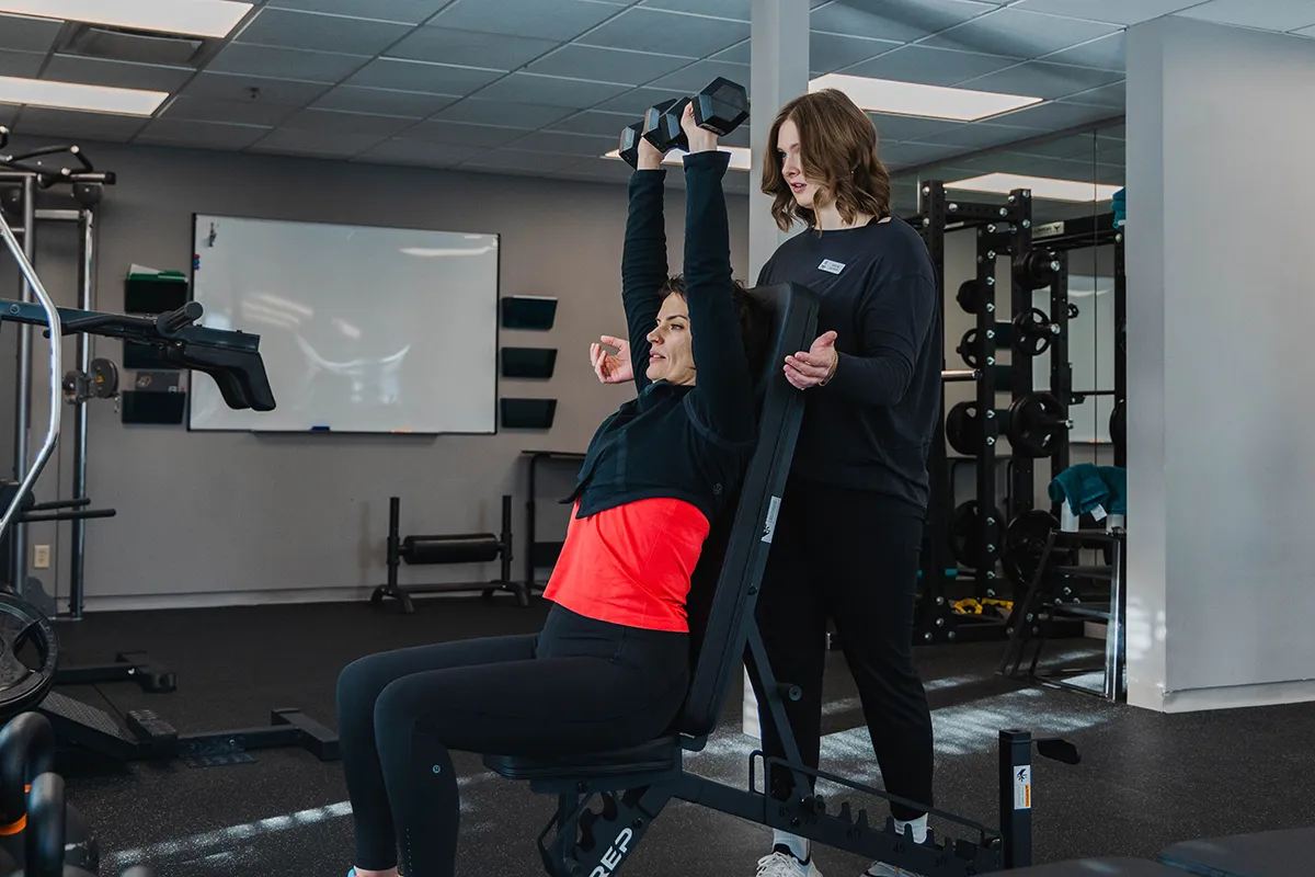 Female Personal Trainer Training Woman Calgary