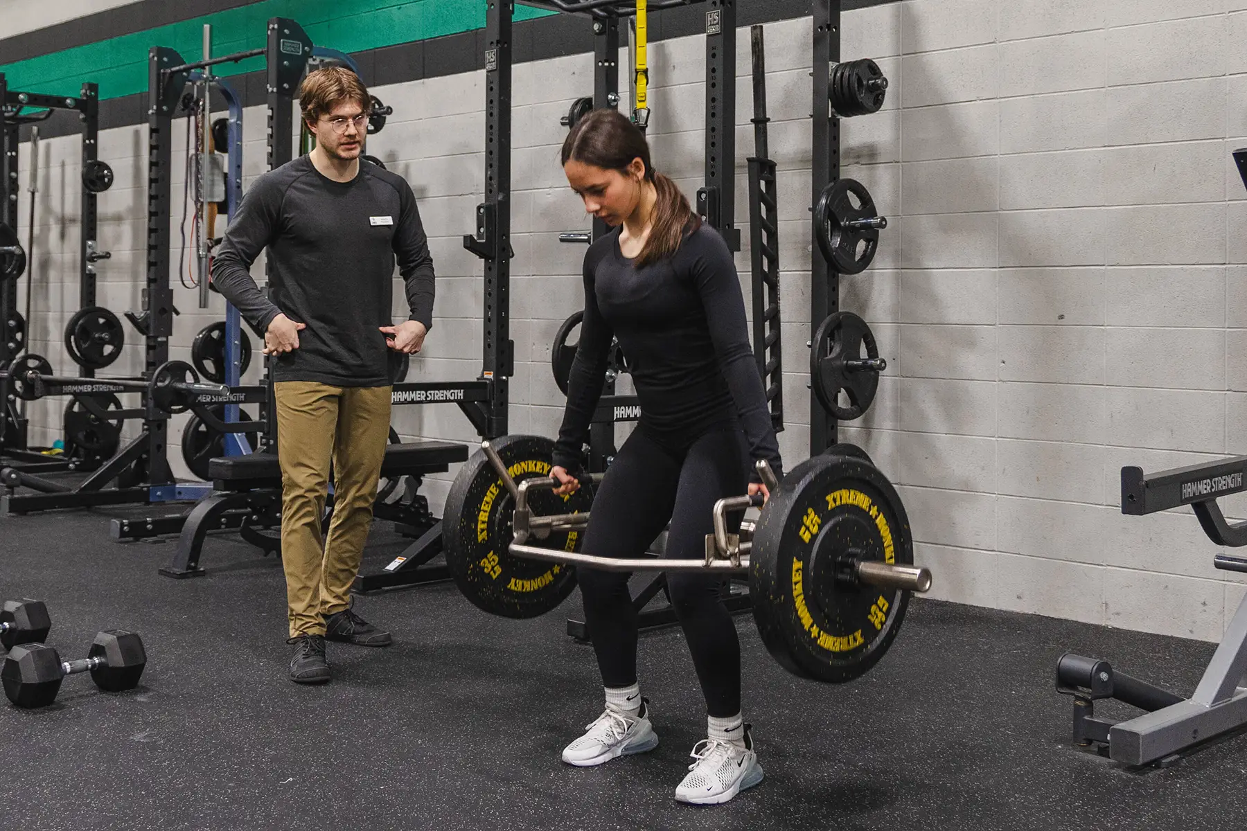 Calgary Personal Trainer Describes Deadlift Form to Athlete